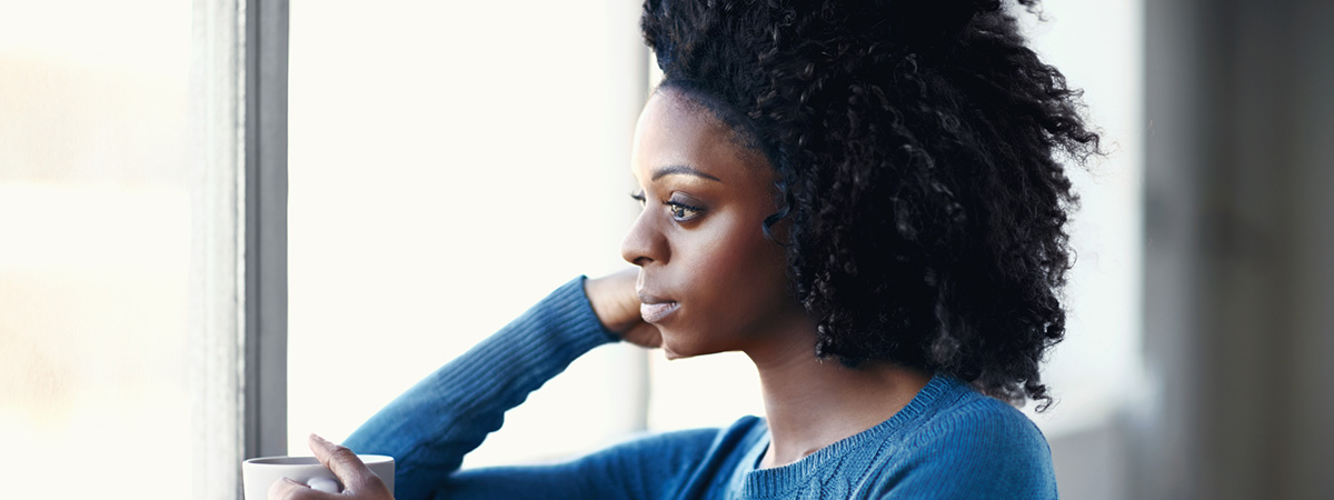 Woman reflecting on what her life would be like without depression in Monmouth Junction